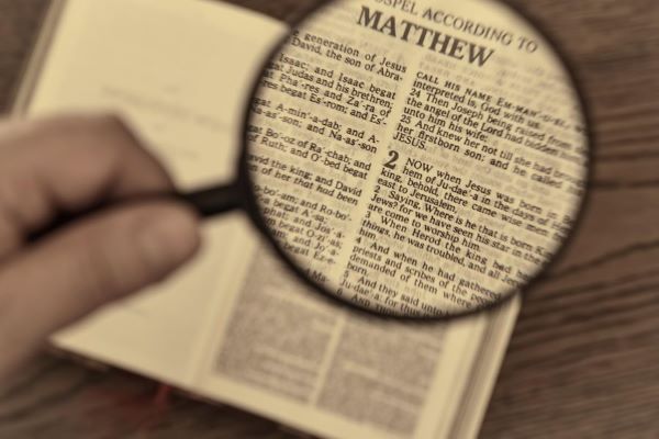 Bible-with-magnifying-glass.jpg